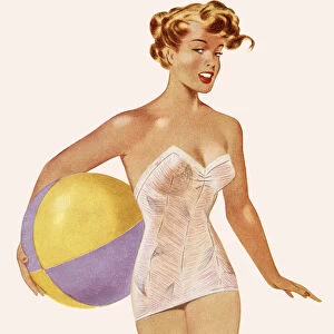 Woman in Bathing Suit Holding a Beach Ball