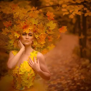 Woman in fall fashion modeling in a Fall scene Woman in fall fashion modeling in a Fall scene