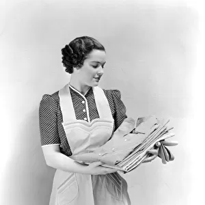 Woman Holding Clean Laundry Shirts Wearing Polka Dot Dress And Apron Pride Housewife
