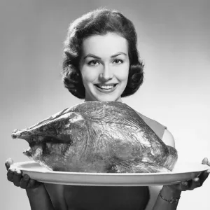 Woman Holding Platter with Roast Turkey Print Woman Holding Platter with Roast Turkey Print