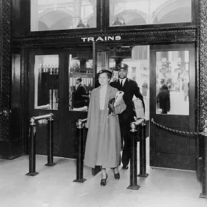 Woman And Porter At Penn Station Woman And Porter At Penn Station
