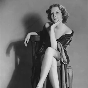 Woman posing in lingerie (B&W), portrait