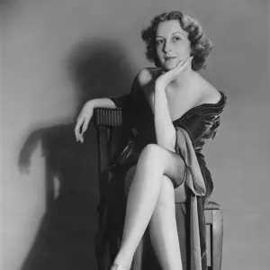 Woman posing in lingerie (B&W), portrait