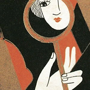 Woman reflected in hand mirror