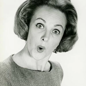 Woman with surprised expression, posing in studio, (B&W), (Portrait)
