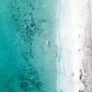 Aerial View of Woman in Turquoise Sea Print Aerial View of Woman in Turquoise Sea Print