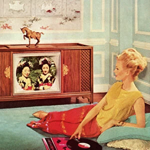 Woman Watching TV In Blue Room