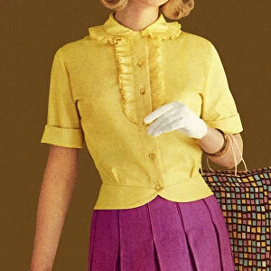 Woman Wearing Yellow Top and White Gloves