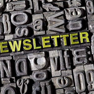 The word newsletter, made of old lead type