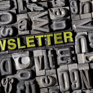 The word newsletter, made of old lead type