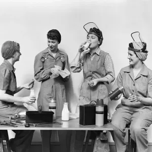 Four World War 2 Women Taking A Lunch Break All Wearing Coveralls & 2 Wearing Raised Face Four World War 2 Women Taking A Lunch Break All Wearing Coveralls & 2 Wearing Raised Face