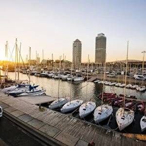Yachts and boats moored at Port Olimpic in Barcelona, Spain