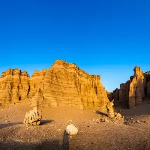 Yardang landform at sunset, Xinajing, China Yardang landform at sunset, Xinajing, China