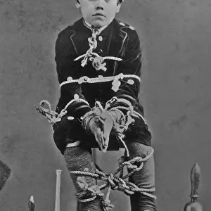 A Young Boy Tied Up
