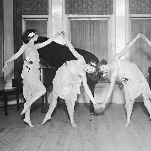 Four young women performing modern dance (B&W)