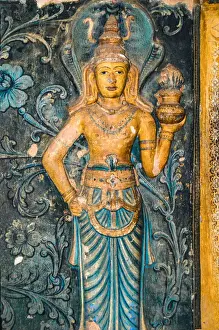 18th century frescoes and statues of Buddhism at entrance to shrine at Dambadeniya Temple (Vijayasundararama temple at Dambadeniya)