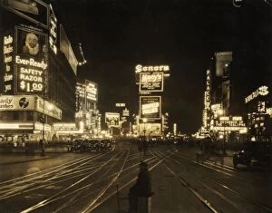 Images Dated 5th April 2016: 1921 View of the traffic and illuminated advertisements in Times Square at night