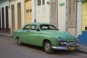 David Henderson Photography Gallery: 1950s Car Parked on Dilapidated Cuban Street