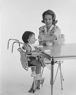 Casual Collection: 1960, Two People, Adult, Baby, Young Adult, Young Women, Baby Boys, Caucasian Appearance