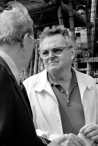 Prints of DAYTONA BEACH, FL - FEBRUARY 1983: Chris Economaki, right, talks with Bill France Sr Full Throttle At Daytona Beach Prints: 1983 Daytona 500