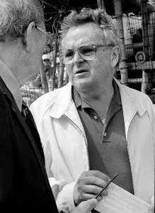 Prints of DAYTONA BEACH, FL - FEBRUARY 1983: Chris Economaki, right, talks with Bill France Sr Full Throttle At Daytona Beach Prints: 1983 Daytona 500