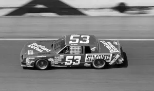 Prints of DAYTONA BEACH, FL - FEBRUARY 1983: NASCAR driver Tom Sneva circles the track during the running of the 1983 Daytona 500 stock car race at Daytona International Speedway in Daytona Beach, Florida Full Throttle At Daytona Beach Prints: 1983 Daytona 500