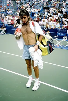 Prints of FLUSHING, NY - CIRCA 1989: Andre Agassi during the 1989 U.S. Open Tennis Tournament circa 1989 in Flushing, Queens. (Photo by Raoul/IMAGES/Getty Images) The Grand Slam Gallery: 1989 U.S. Open Tennis Tournament
