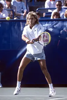 Prints of FLUSHING, NY - CIRCA 1989: Andre Agassi at the 1989 U.S. Open Tennis Tournament circa 1989 in Flushing, Queens. (Photo by PL Gould/IMAGES/Getty Images) The Grand Slam Gallery: 1989 U.S. Open Tennis Tournament