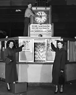 New Haven Prints: 2 Women Point To Man Moving Clock Hands