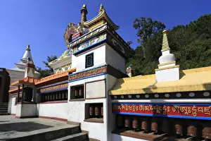Non Western Script Prints: 245 foot long prayer wheel wall and Buddhist Stupa