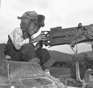 24th Infantry Division's Adopted Child Al Pretends To Shoot On A Tank