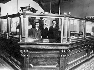 3 Men Bank Tellers