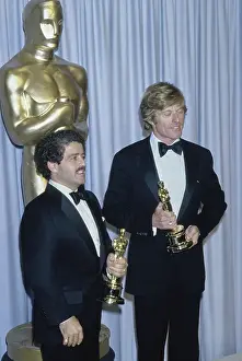 Prints of American film producer Ronald L Schwary and American actor Robert Redford, both wearing a tuxedo and a bow tie, in the 53rd Academy Awards press room, at the Dorothy Chandler Pavilion, Los Angeles Robert Redford: Classic Hollywood Elegance: 53rd Academy Awards