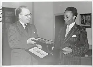 A. C. Jones Handing Portrait to The Kabaka of Buganda