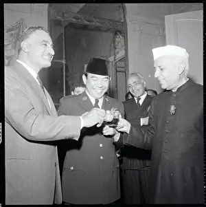 Sukarno Prints: A. Nasser and A. Sukarno Toast with J. Nehru