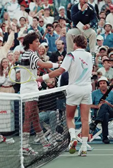 Prints of American tennis player Jimmy Connors (right) shakes hands with Aaron Krickstein after defeating him in the fourth round of the US Open in New York, September 2nd 1991 A Game of Elegance: Tennis Through the Ages: Aaron Krickstein And Jimmy Connors