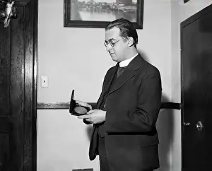 Theory Prints: Abbe Georges Le Maitre Holding Medal