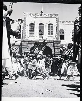 Abdullah Sallal Watches Troops from Window