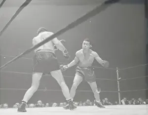 Abe Simon and Joe Louis in Heavy Boxing Action