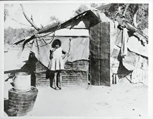 Aborigine in front of Dwelling