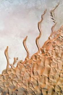 Abstract swirls in the desert dunes, United Arab Emirates