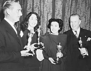Academy Award Winners Holding Oscars