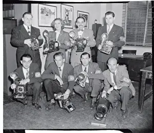 Acme Newspaper Cameramen Posing with Their Cameras