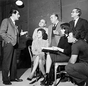 Conversation Prints: Action Group Taking Direction On Stage