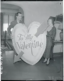 Actor Bradley Page Giving Large Valentine to His Wife