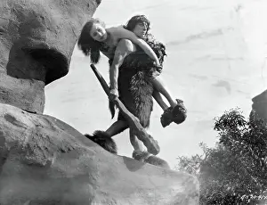 Landforms Prints: Actor Buster Keaton and Female Costar in Caveman Scene