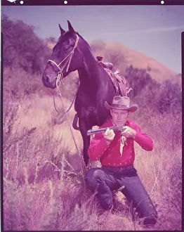 Grassland Prints: Actor Chuck Connors in Rifleman Outdoor Scene