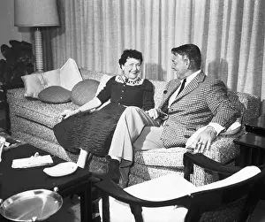 Actor Clark Gable Conversing with Editor Louella Parsons