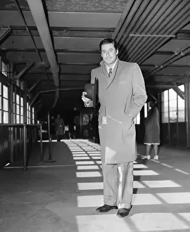 Traveler Prints: Actor Errol Flynn in La Guardia Airport