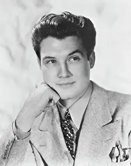 Actor George Reeves Posing with One Hand to His Cheek